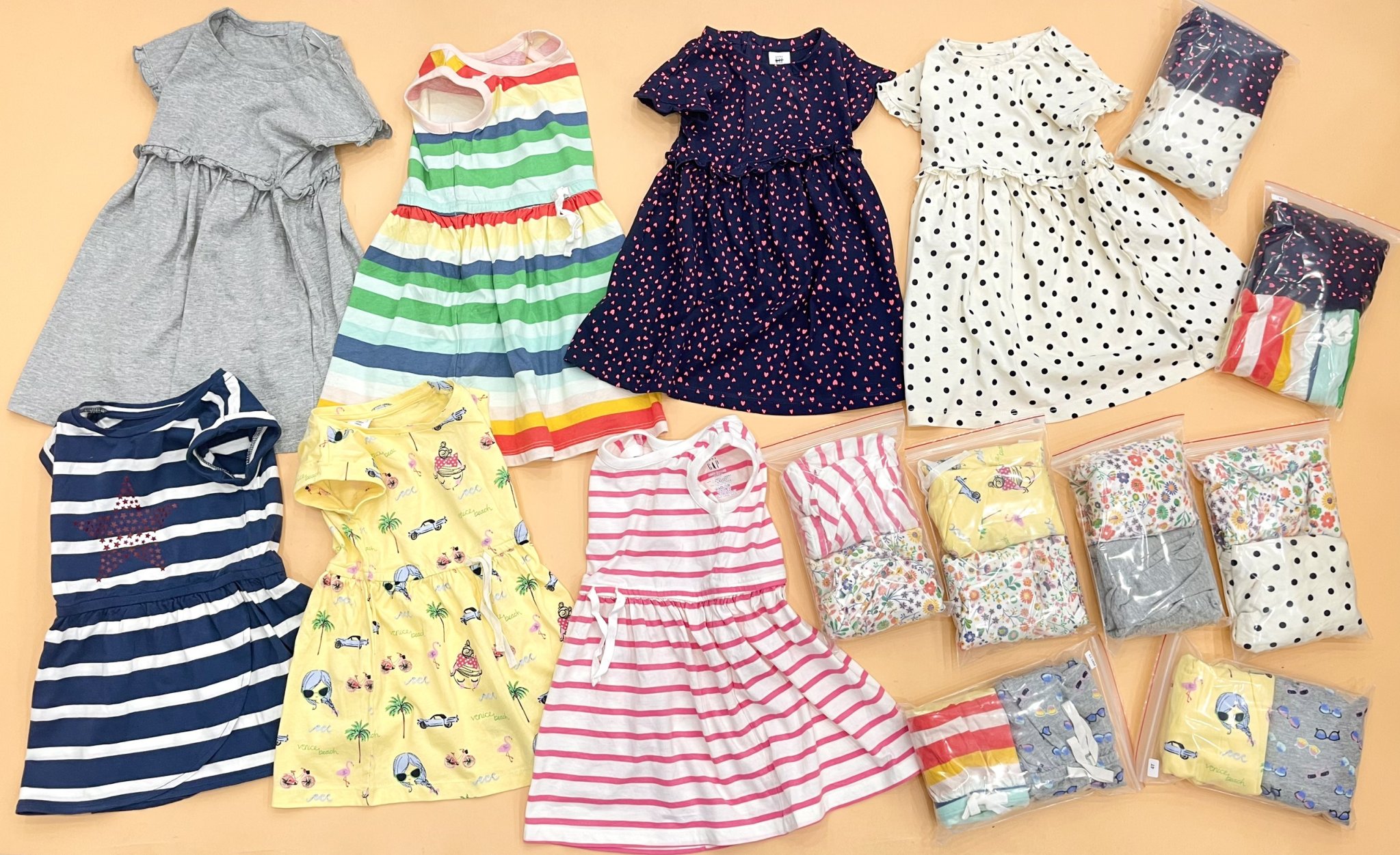 Set 2 đầm thun sát nách / tay ngắn in họa tiết toàn phần Baby Gap, size 6/12M - 5T. Cambodia xuất xịn